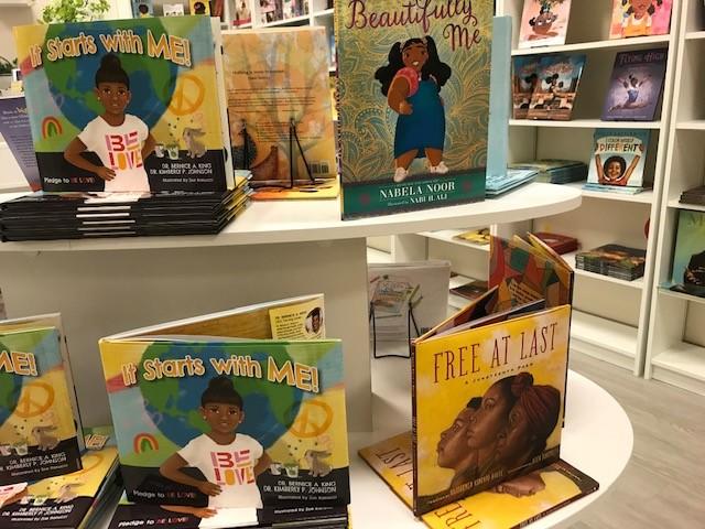 A selection of multicultural books at Cynthia Shambry's bookstore at the New Black Wall Street Market in Stonecrest, Ga.