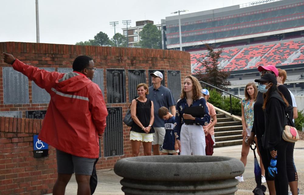  The University of Georgia says on its website the University Health Center’s clinical staff are trained and ready to identify any patient showing symptoms consistent with monkeypox infection. A guide took new students and their parents on a tour of UGA in front of Sanford Stadium August 2021. 