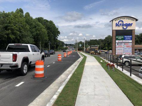 Kroger and the owners of the Wesleyan Station shopping center privately funded safety studies and construction of a GDOT approved new entrance and signal light in the 4600 block of Forsyth Road. 