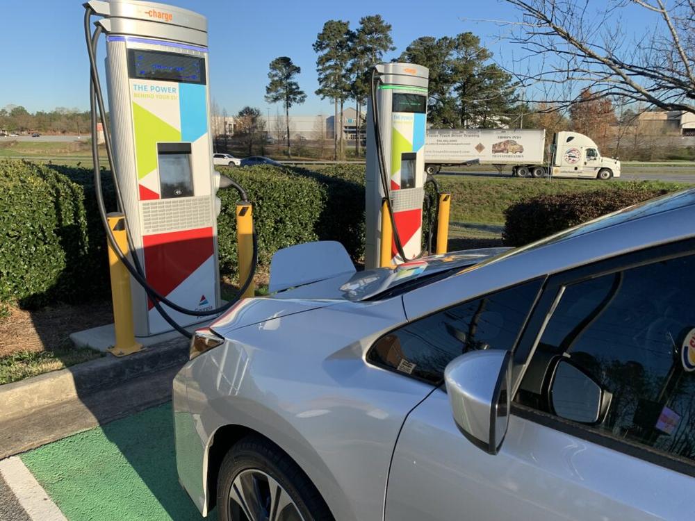 An electric vehicle charges up at a Georgia Power station located in the parking lot of a Burger King in Columbus. 