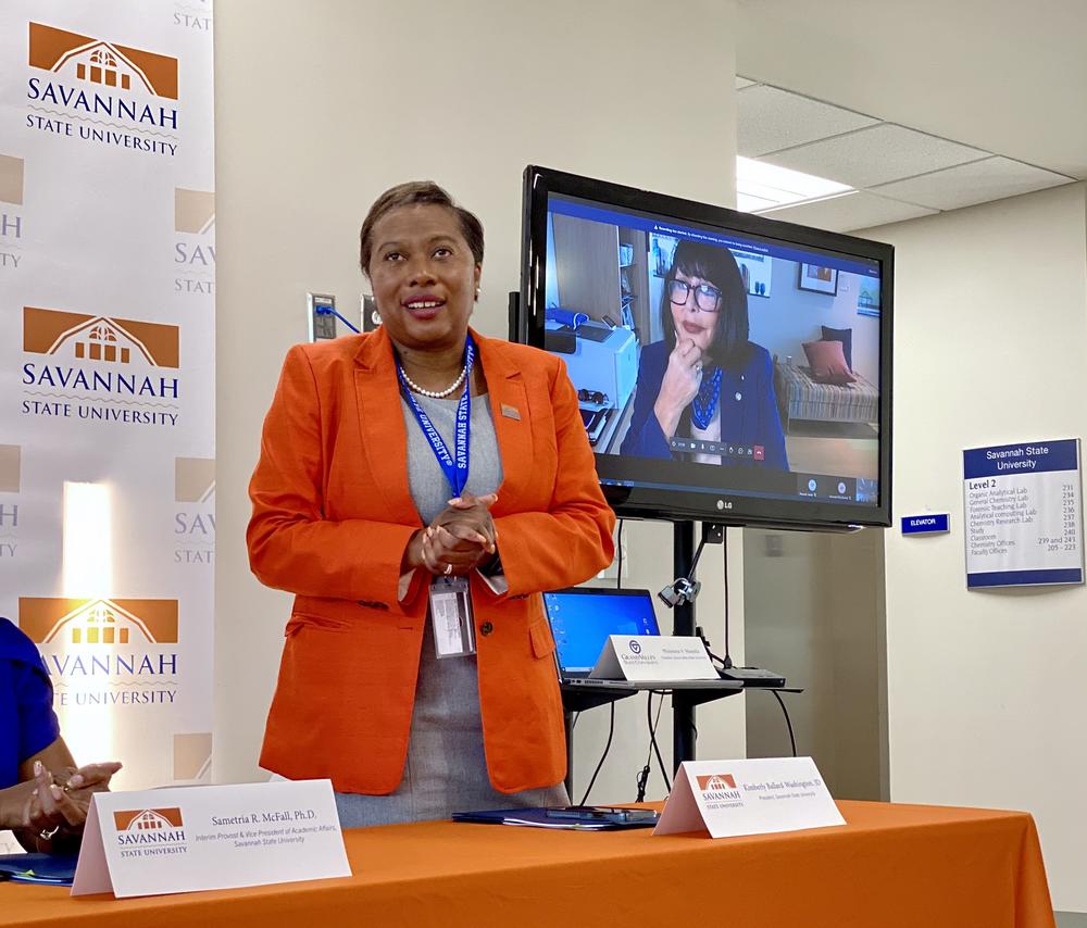 Savannah State University president Kimberly Ballard-Washington speaks at a signing ceremony at the HBCU's campus, as Grand Valley State University president Philomena Mantella watches remotely from her office near Grand Rapids, Michigan.