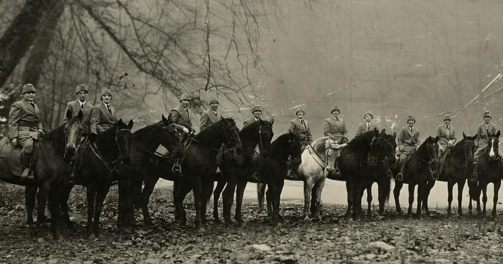 A line of women on horseback in the 1920s.