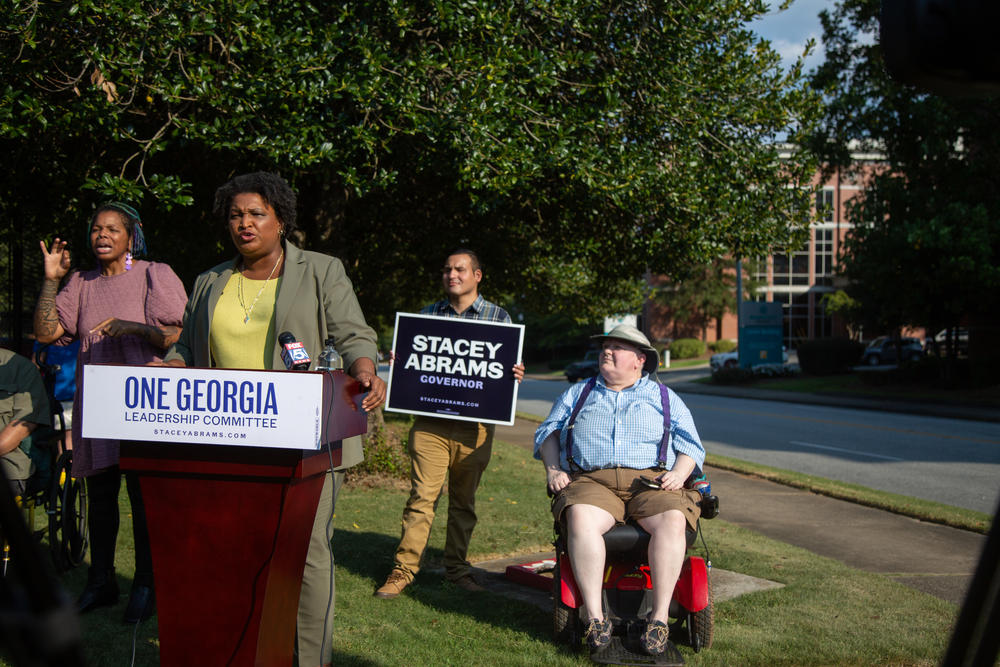 Gubernatorial candidate Stacey Abrams makes a campaign stop in Macon, outside Atrium Health Navicent hospital on Sept. 22, 2022.