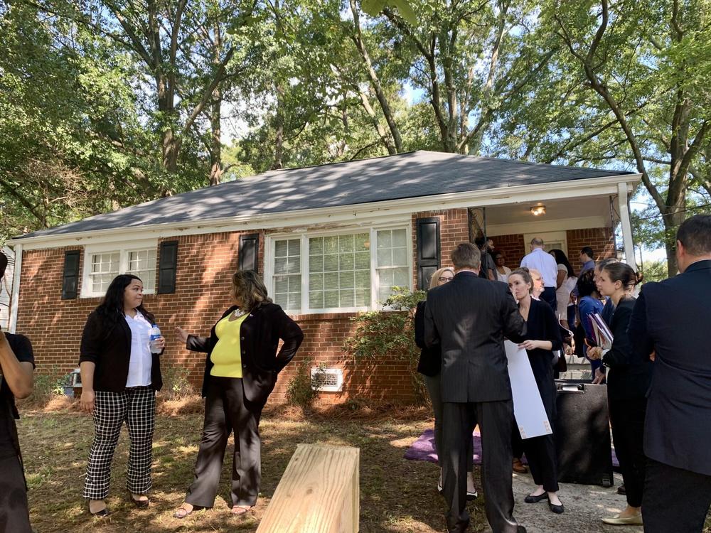  On Sept. 12, Atlanta city officials, nonprofit housing advocates and representatives with health care provider CareSource gathered on site of one of the homes that will provide more affordable rental housing through an Atlanta Neighborhood Development Partnership campaign. Stanley Dunlap/Georgia Recorder 