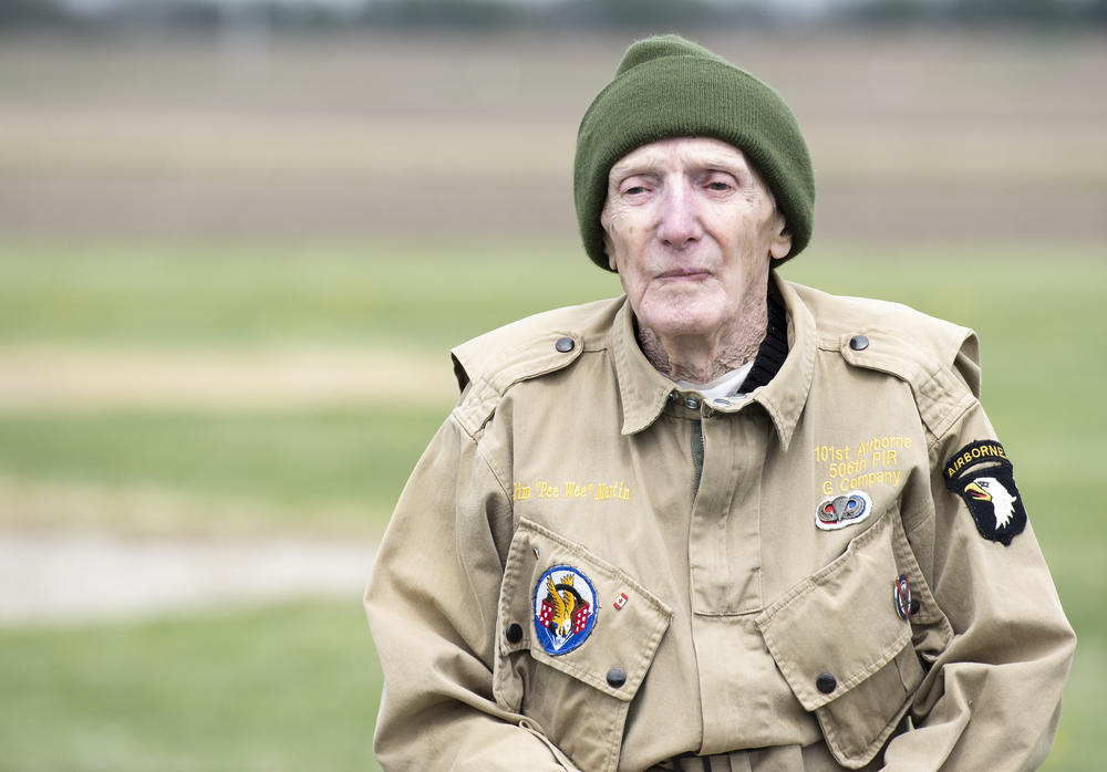 Jim "Pee Wee" Martin is shown at age 100 in military uniform.