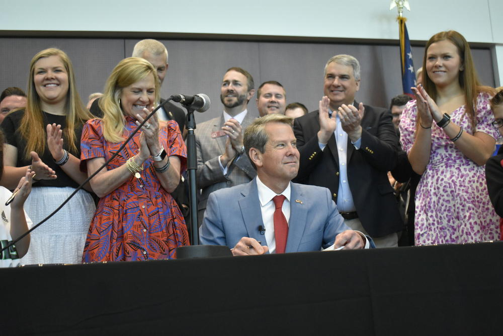  Gov. Brian Kemp signs education bills in April 2022.