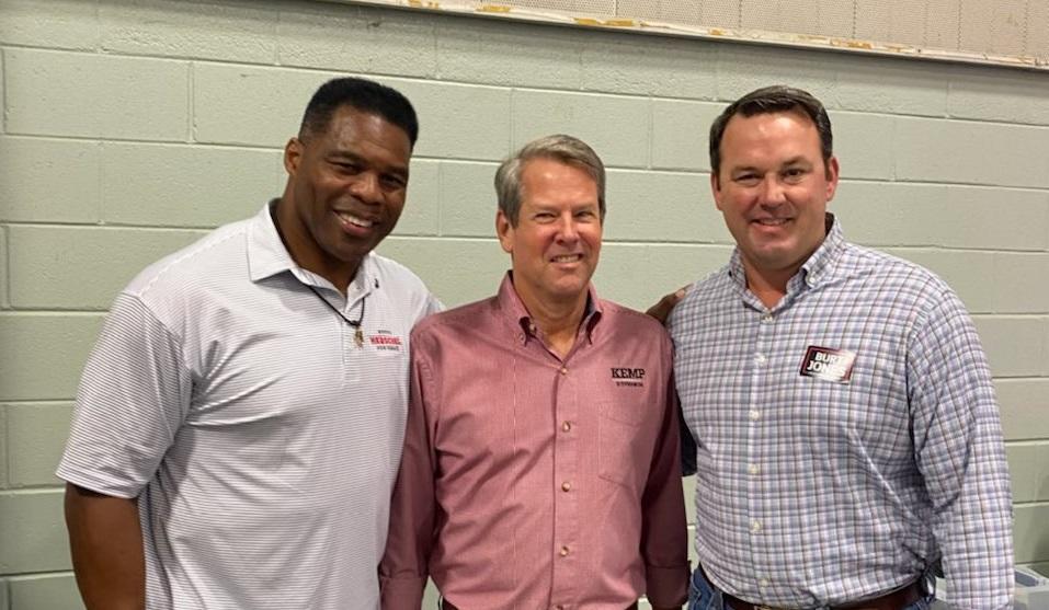 Herschel Walker, Brian Kemp and Burt Jones pose for a photo