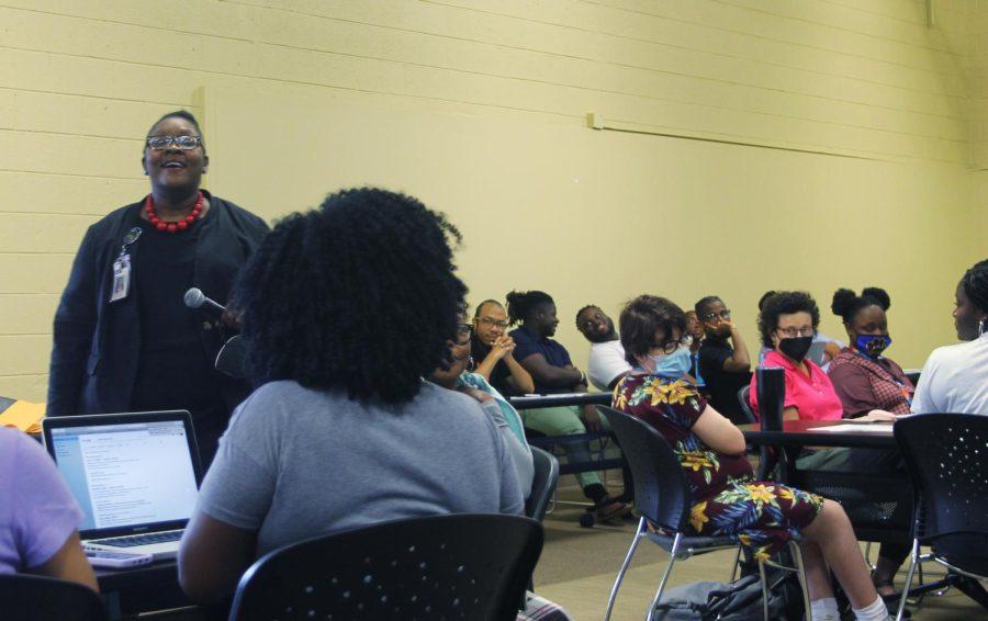 Curlandra Lightfoot Smith, Positive Behavioral Intervention and Supports coordinator for Bibb Schools, leads the first monthly professional learning night of the school year on Sept. 8, 2022, for new teachers who are “career changers.”