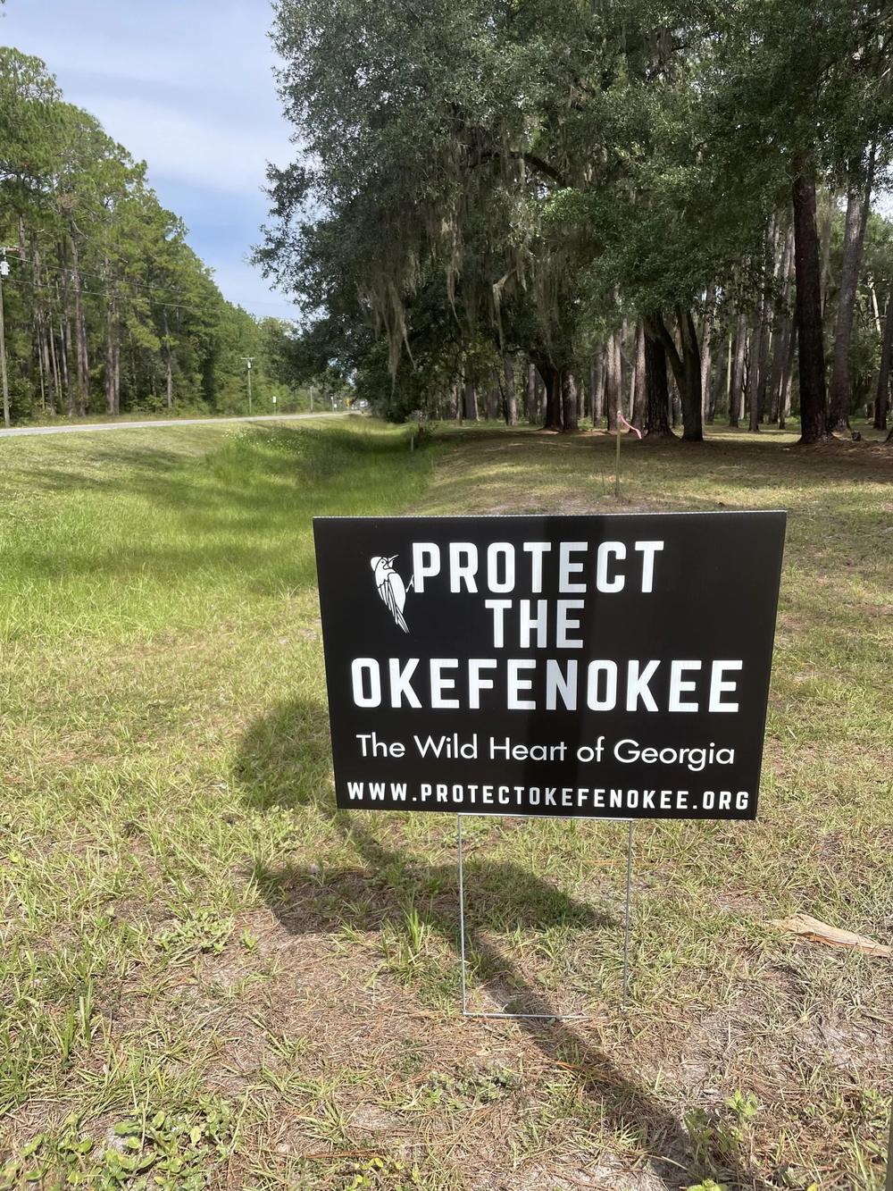 A yard sign near the entrance to the Suwanee River Eco-Lodge at Stephen Foster State Park. Credit: Mary Landers/The Current