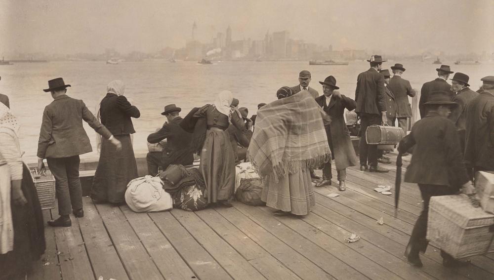 Immigrants waiting to be transferred, Ellis Island, October 30, 1912.