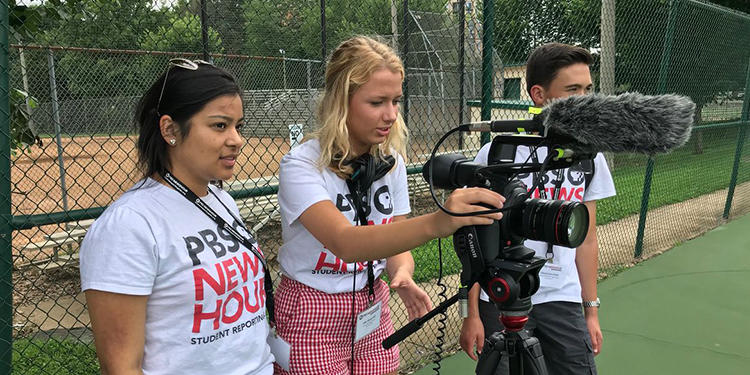 Students recording on video.