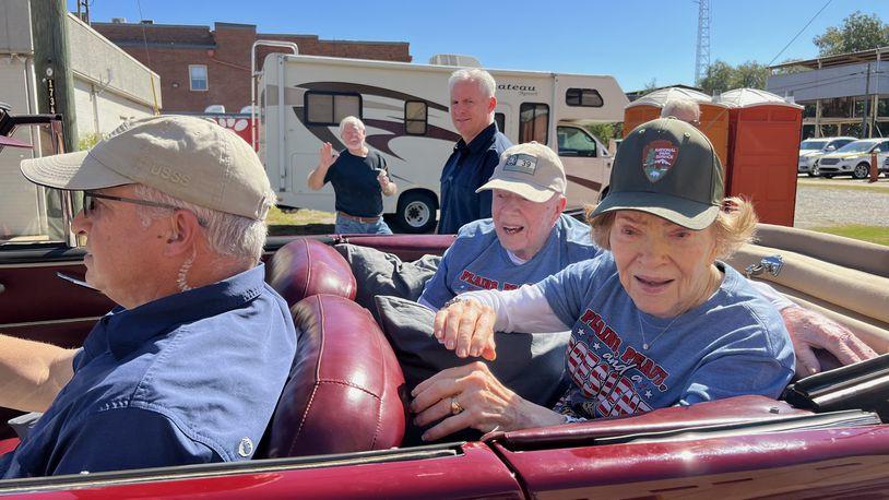 The most recent public photo of the Carters depicts the pair riding through Plains Peanut Festival in Plains, Ga. on Sept. 24 in a red 1946 Ford convertible. The car was a gift from country singers Trisha Yearwood and Garth Brooks.