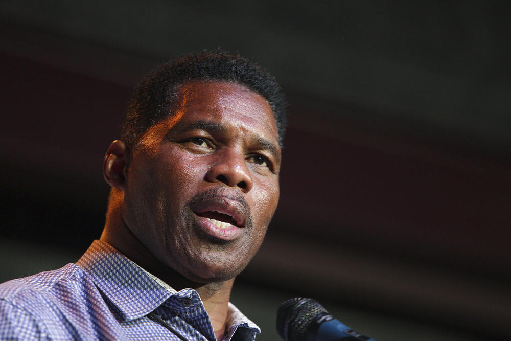 Herschel Walker, GOP candidate for the US Senate for Georgia, speaks at a primary watch party on May 23, 2022, at the Foundry restaurant in Athens, Ga. According to a new report published late Monday, Oct. 3 Walker, who has vehemently opposed abortion rights as the Republican nominee for U.S. Senate in Georgia, paid for an abortion for his girlfriend in 2009 The candidate called the accusation a “flat-out lie” and threatened to sue.