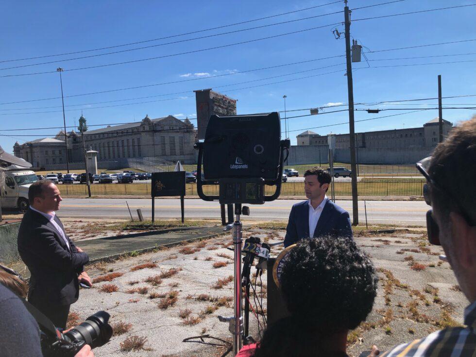 U.S. Sen. Jon Ossoff speaks with reporters after inspecting the federal penitentiary in Atlanta. (Photo credit: Dave Williams)