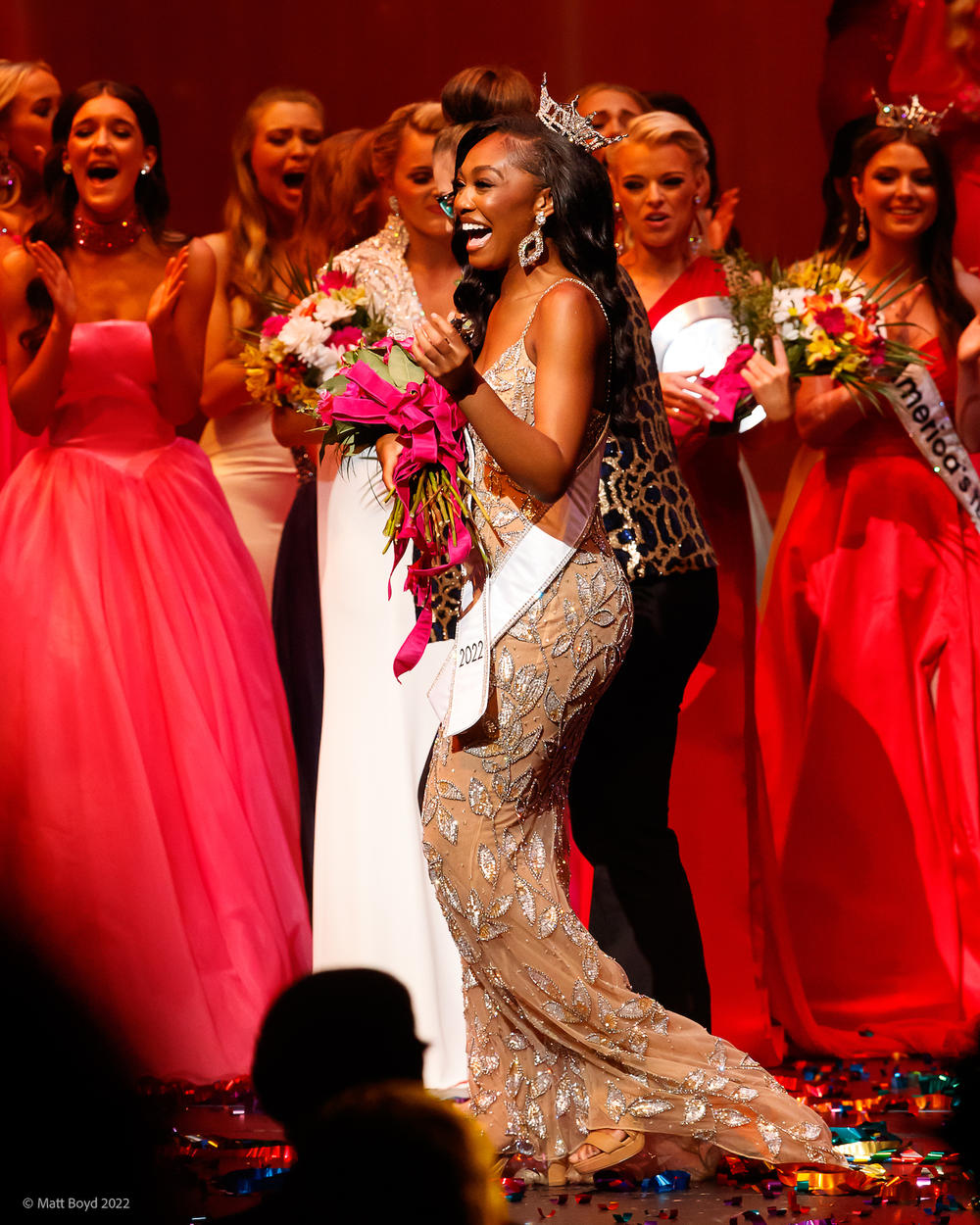  Kelsey Hollis, the new Miss Georgia, walks across the pageant stage.
