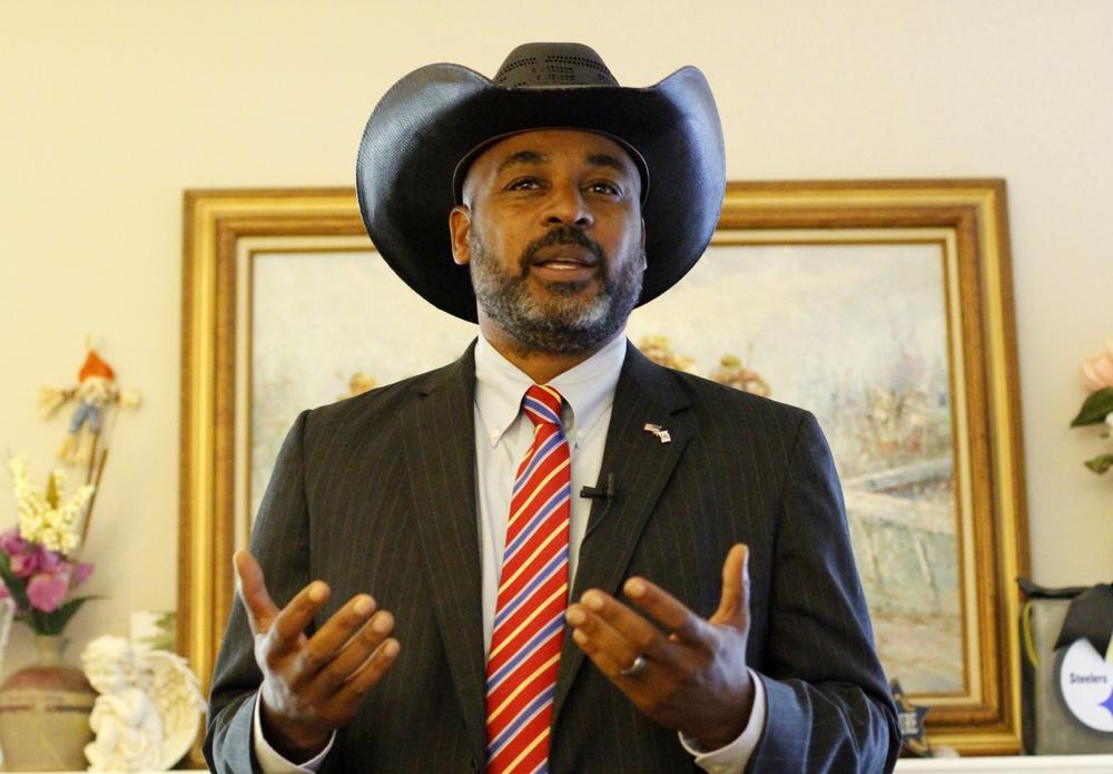 Marcus Flowers speaks at a campaign event in Acworth, Ga.