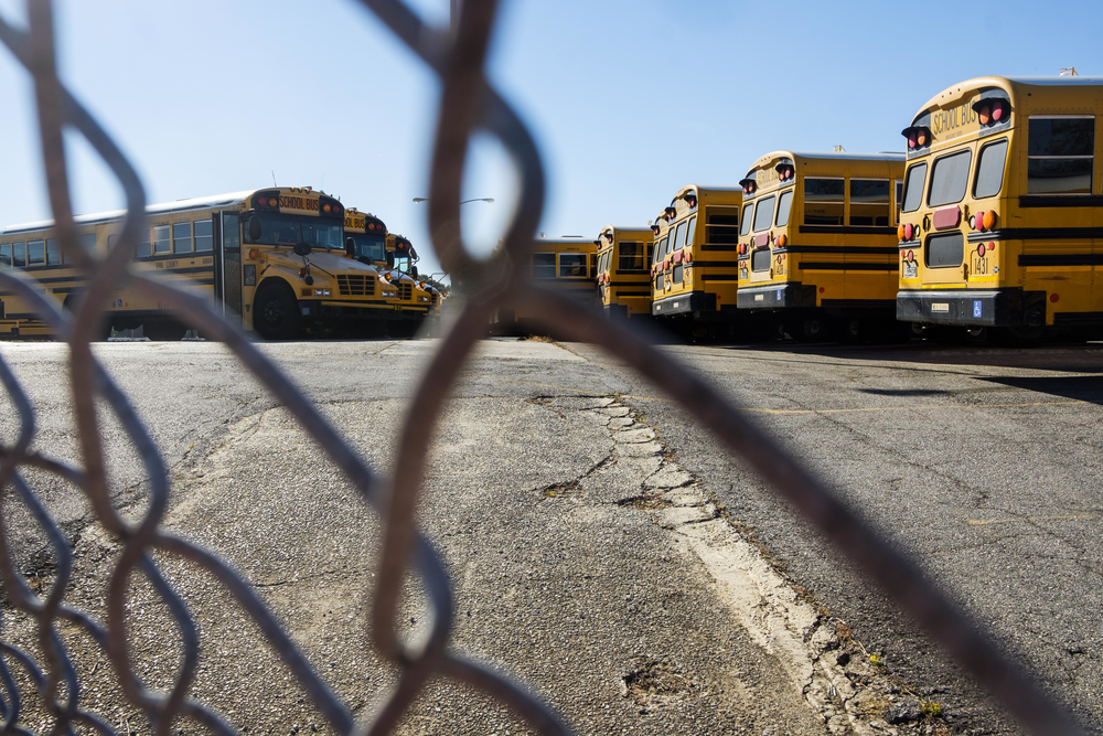 Buses belonging to Bibb County Schools, one of the dozens of Georgia districts wait listed for a federal program which is paying to put electric school buses on the road. 