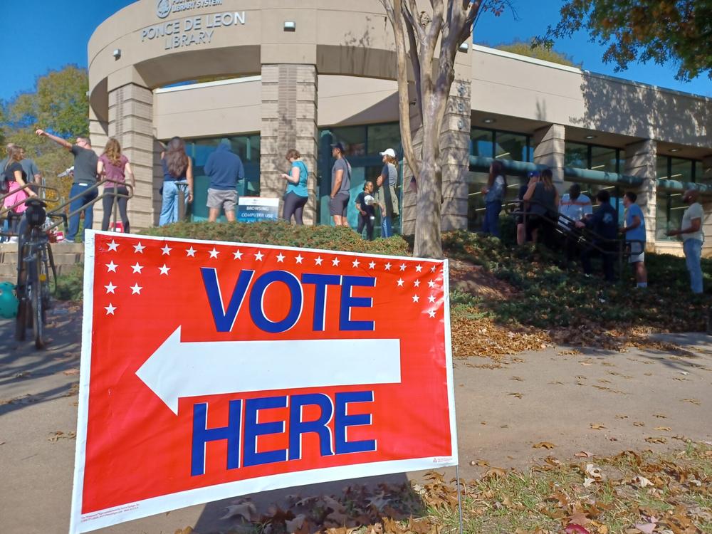  The line of people waiting to cast ballots stretched around Atlanta’s Joan P. Garner library at Ponce de Leon Avenue and down the block after lunch on 2022’s last day of early voting. John McCosh/Georgia Recorder