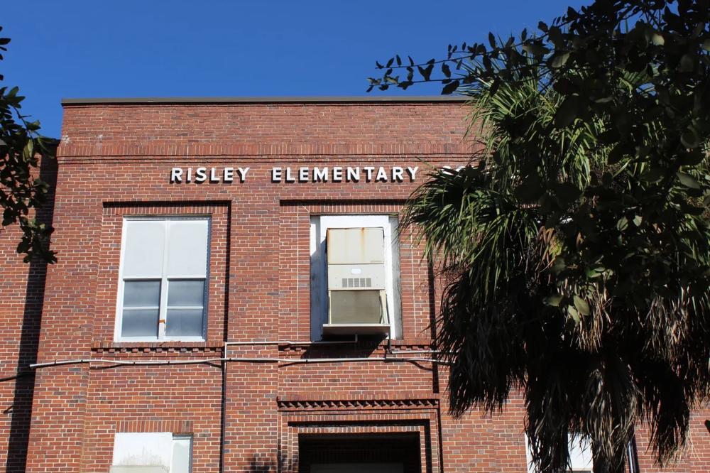The historic Risley School in Brunswick off of Albany Street was the city’s first school for African Americans and opened in 1870. The school no longer educates children but may be the site of a future “justice center,” according to local advocates.  Credit: Erika Curtis/Georgia Justice Project