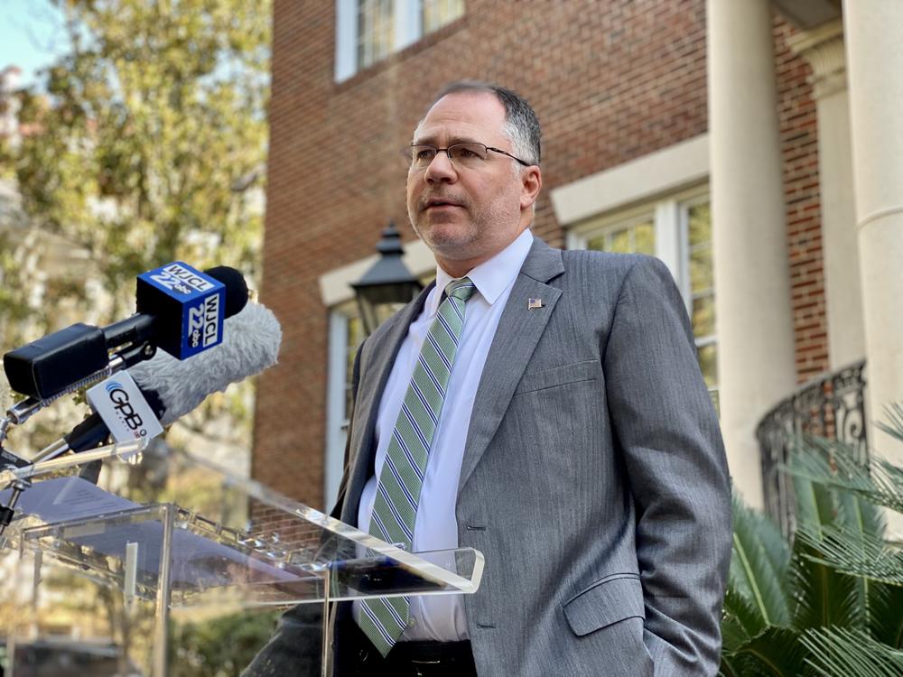 U.S. Attorney for the Southern District of Georgia David Estes speaks outside the United Way of the Coastal Empire in downtown Savannah on Dec. 8, 2022, about federal funding for Tharros Place.