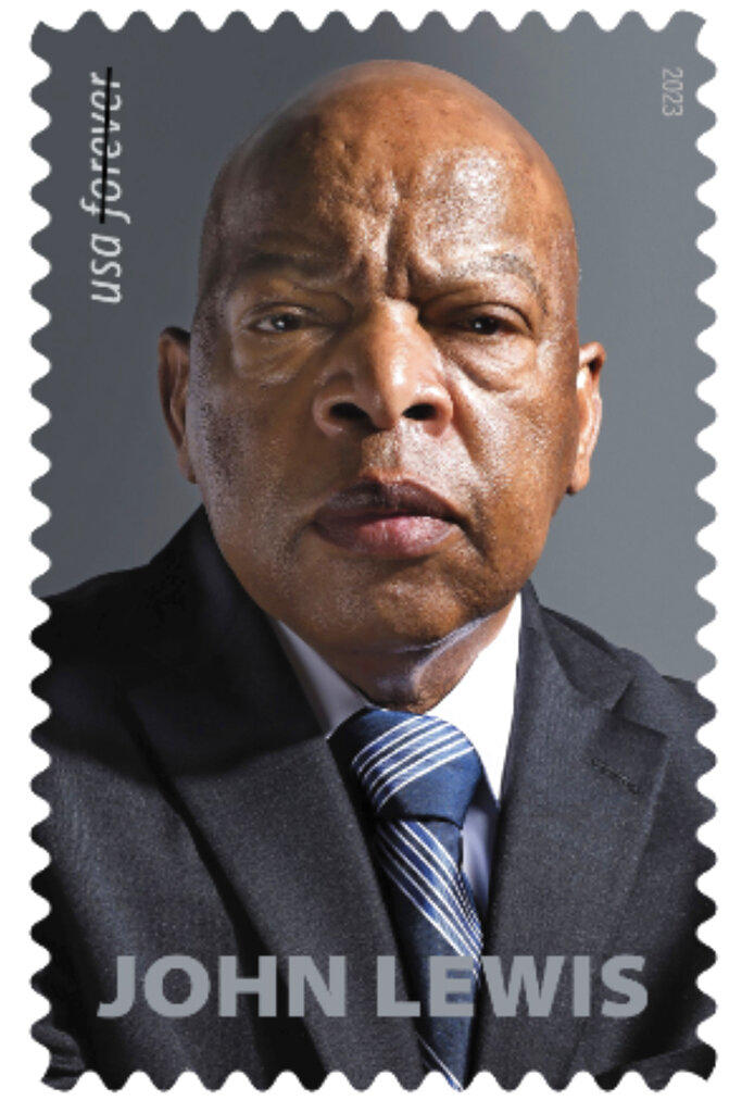 This image provided by the U.S. Postal Service on Tuesday, Dec. 13, 2022, shows a new postage stamp honoring the late congressman and civil rights giant John Lewis. (U.S. Postal Service via AP)