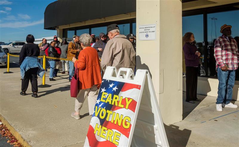Voters waiting patiently in line to vote in Bibb County on Dec. 1, 2022