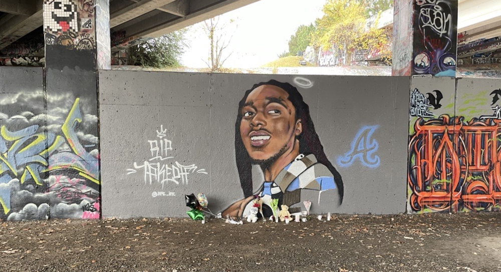 A mural of rapper Takeoff of Migos on Atlanta's BeltLine trail.