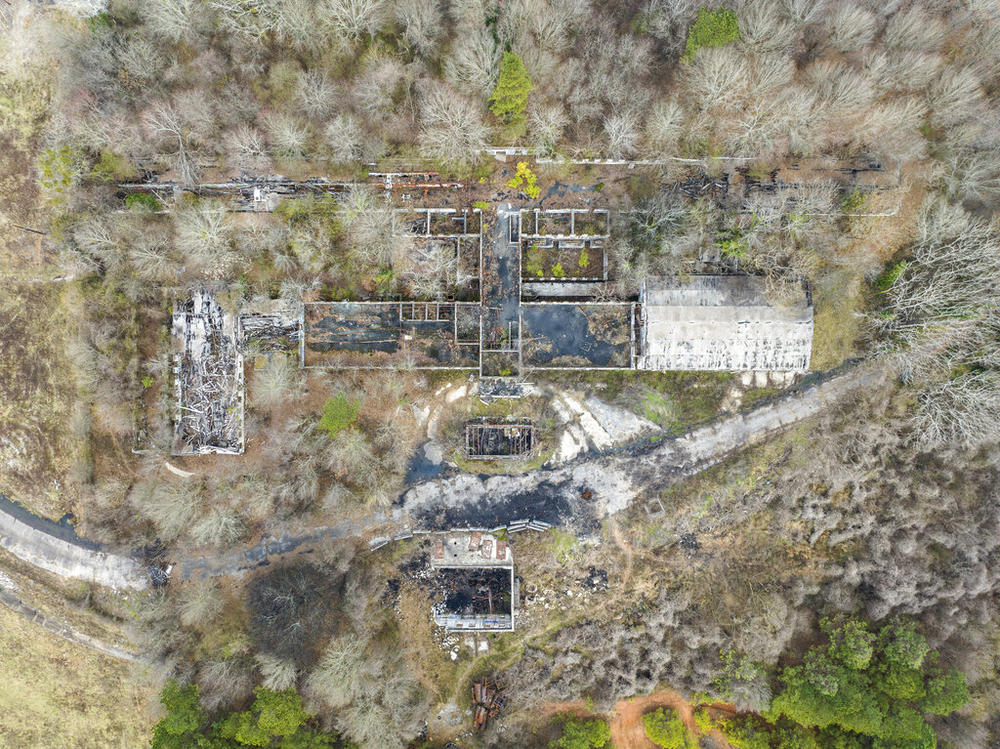 In this aerial view, a structure sits on land owned by the city of Atlanta, Thursday, Jan. 26, 2023, in unincorporated DeKalb County. The Atlanta City Council has approved plans to lease the land to the Atlanta Police Foundation so it can build a state-of-the-art police and firefighter training center, a project that protesters derisively call “Cop City.” 