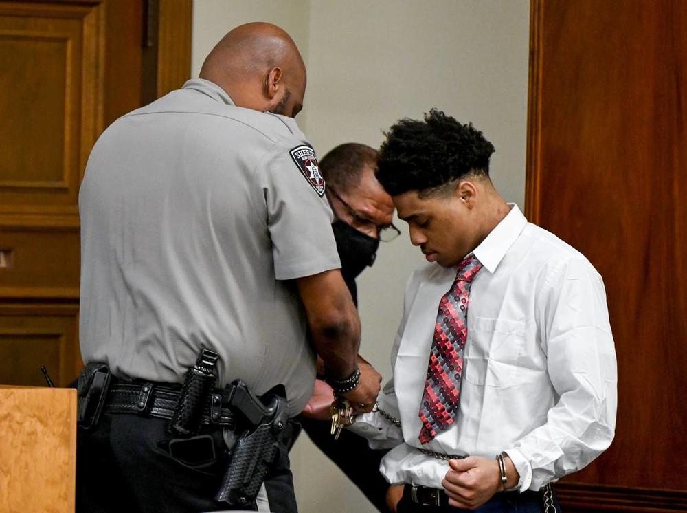 Transport restraints are removed from Jeremy Kendrick Jr. in a Bibb County Superior courtroom during his murder trial Thursday afternoon. Kendrick Jr. is charged in the holdups and killings of clerks who were slain a week apart in August 2018. 