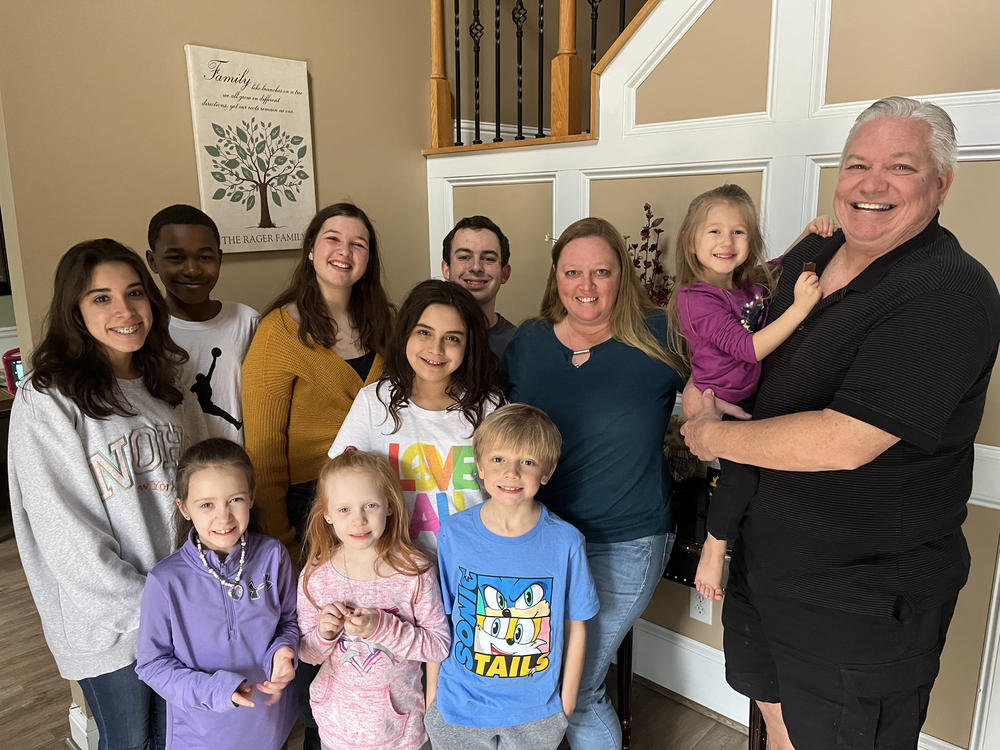 Lisa Rager knows well the hurdles to obtaining services for foster kids. She and her husband, Wes, have cared for more than 100 foster children and adopted 11 of them, many of whom are pictured. Rager says one child waited more than a year for an appointment to see a specialist doctor.