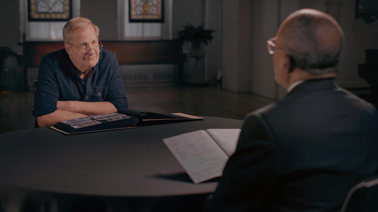 Actor Jeff Daniels sitting across from Henry Louis Gates, Jr.