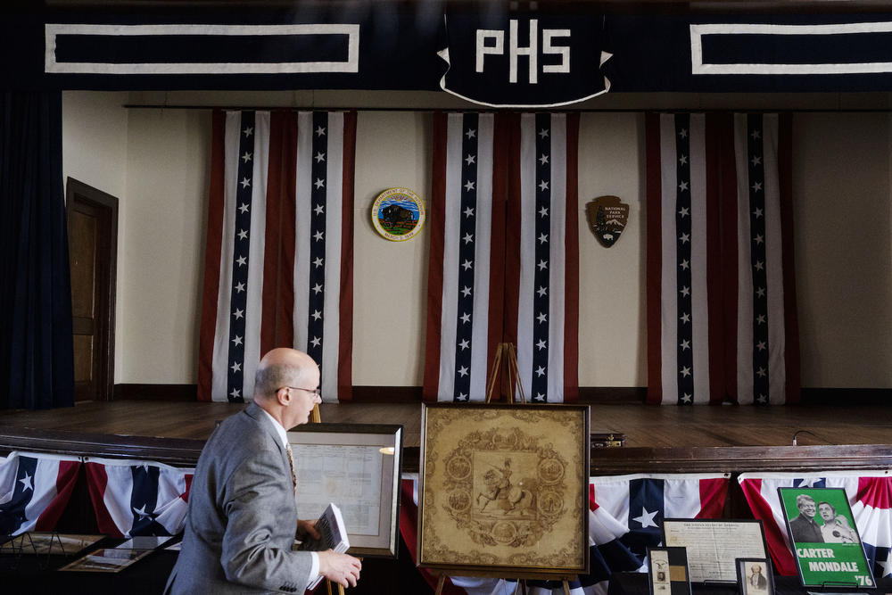 Presidential historian Laurence Cook arranges his memorabilia before his annual Presidents' Day lecture at the Jimmy Carter National Historic Site in Plains, Ga. Monday.