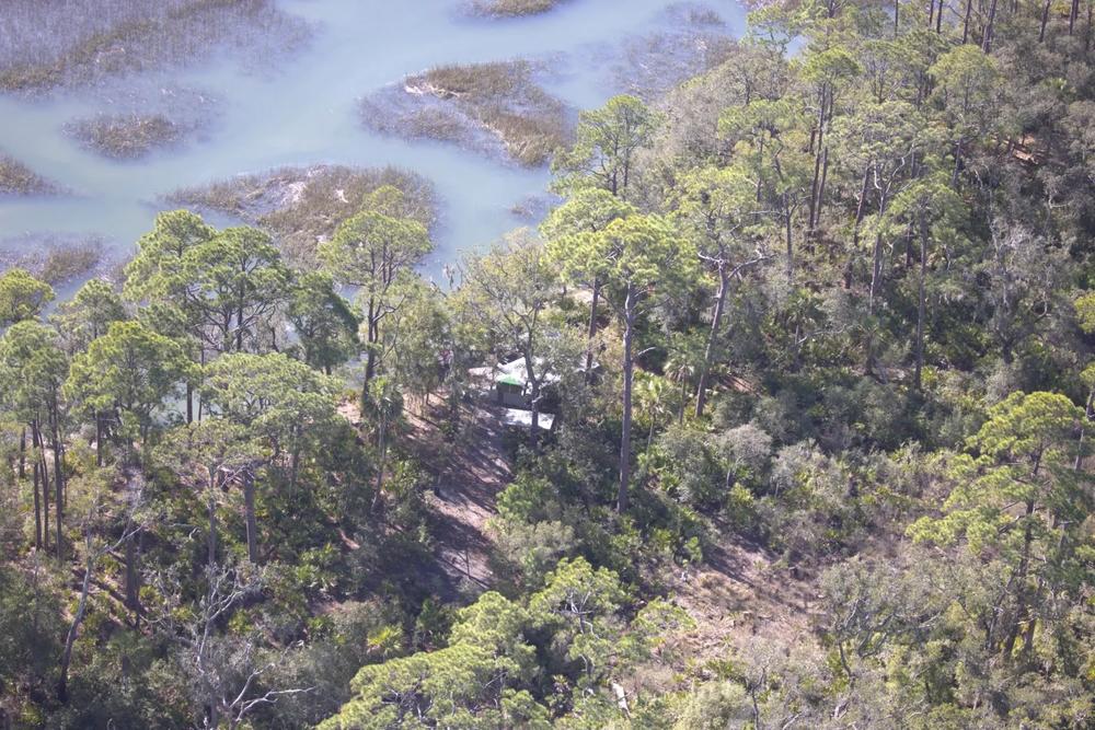 A Georgia Department of Natural Resources drone captured this image of an illegally built structure on Long Island in the Little Tybee and Cabbage Islands Natural Area. DNR personnel examined the structure in person for the first time this week. Credit: Georgia DNR