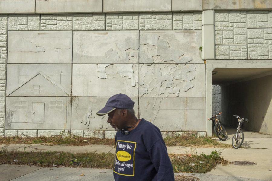 Peter Givens near the entrance of a pedestrian bridge over Interstate 75 that connects the west an east sides of the Pleasant Hill neighborhood. The neighborhood was severed in the ’60s with the construction of Interstate 75. 