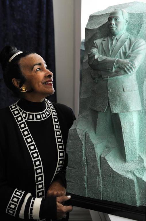 Xernona Clayton, who was a special assistant to Martin Luther King, Jr., looks at a model of the Stone of Hope, the centerpiece of the Martin Luther King, Jr. National Memorial Project. / AP Photo