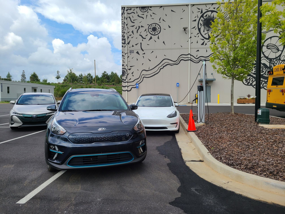 Electric vehicle owners visited the EV roadshow when it stopped in Fayetteville, Ga., Aug. 18, 2022.