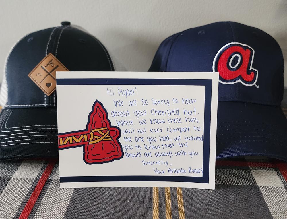 When Ryan Douglas lost the hat his late father gave him, the Braves sent him replacements, along with a note.