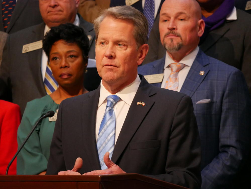  Gov. Brian Kemp speaks to reporters after signing the amended fiscal year 2023 budget in early March. Jill Nolin/Georgia Recorder