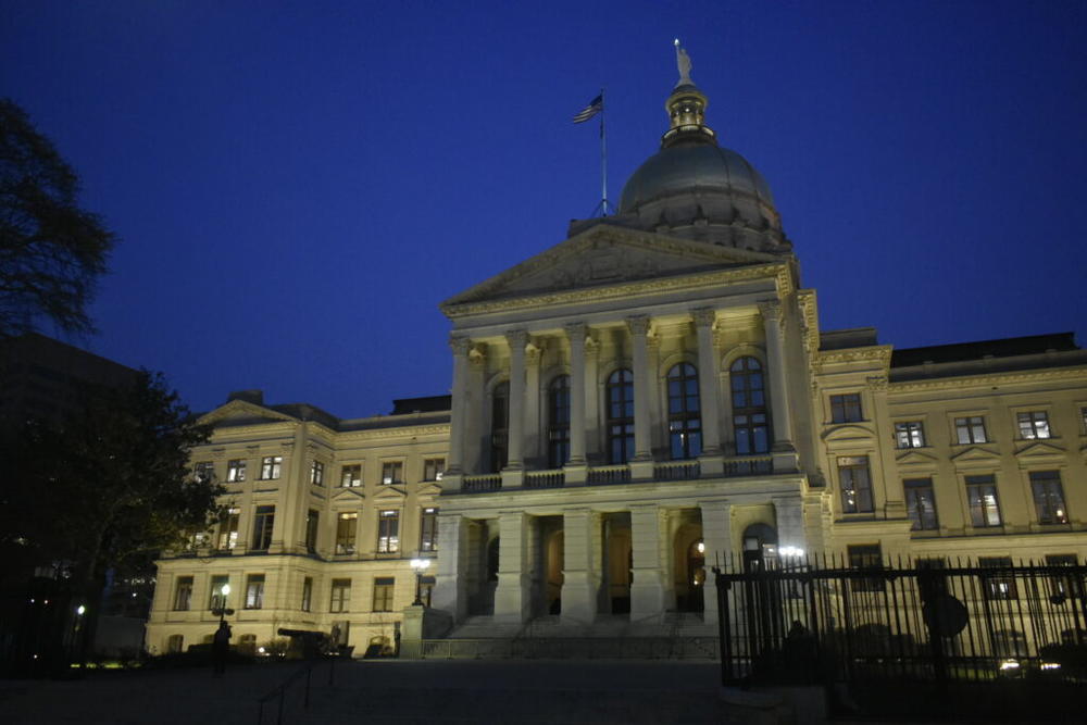 A nighttime shot of the Georgia Capitol