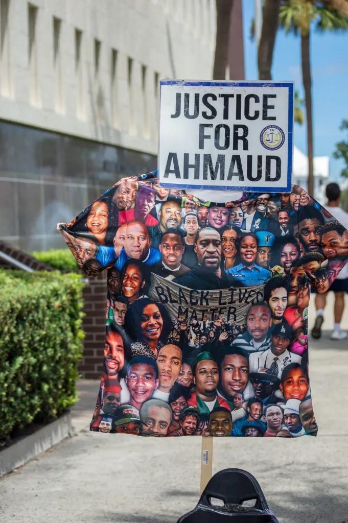 Sign outside of the federal courthouse in Brunswick during the sentencings of the men convicted of hate crimes for killing Ahmaud Arbery on Aug. 8, 2022.