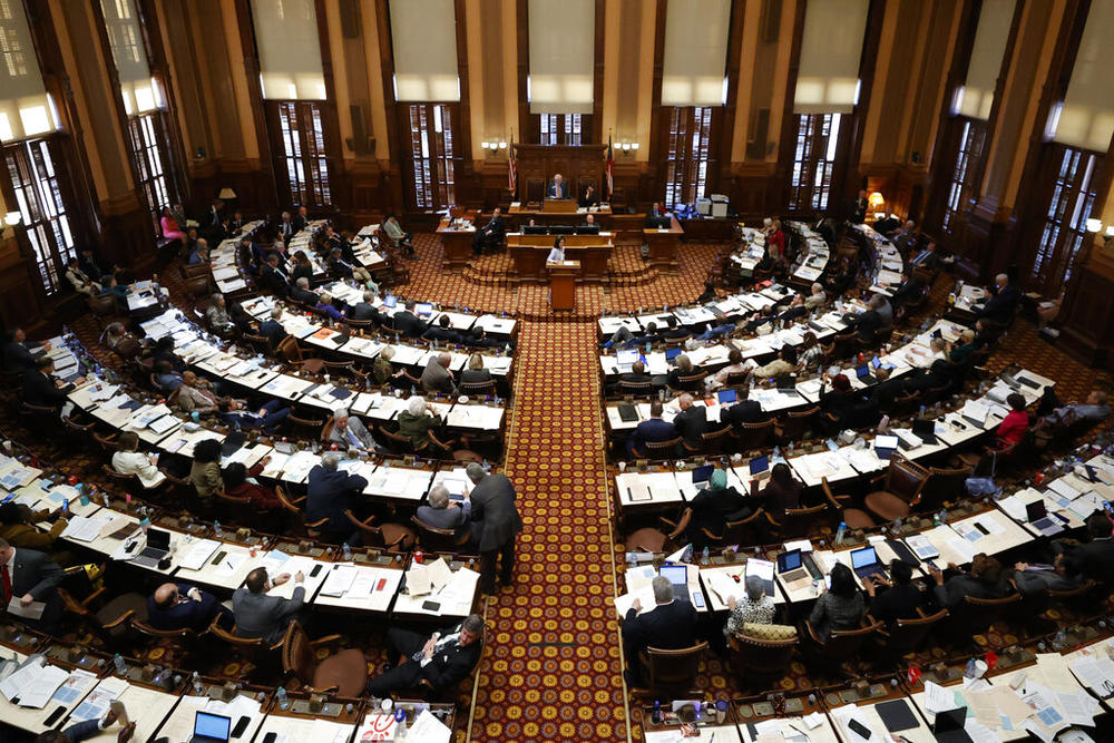 Lawmakers work in the House chambers during crossover day at the Georgia State Capitol on Monday, March 6, 2023, in Atlanta.