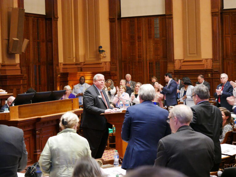 Rep. Matt Hatchett, a Dublin Republican, receives a standing ovation while presenting next year’s spending plan late on the final day of the 2023 legislative session. Jill Nolin/Georgia Recorder