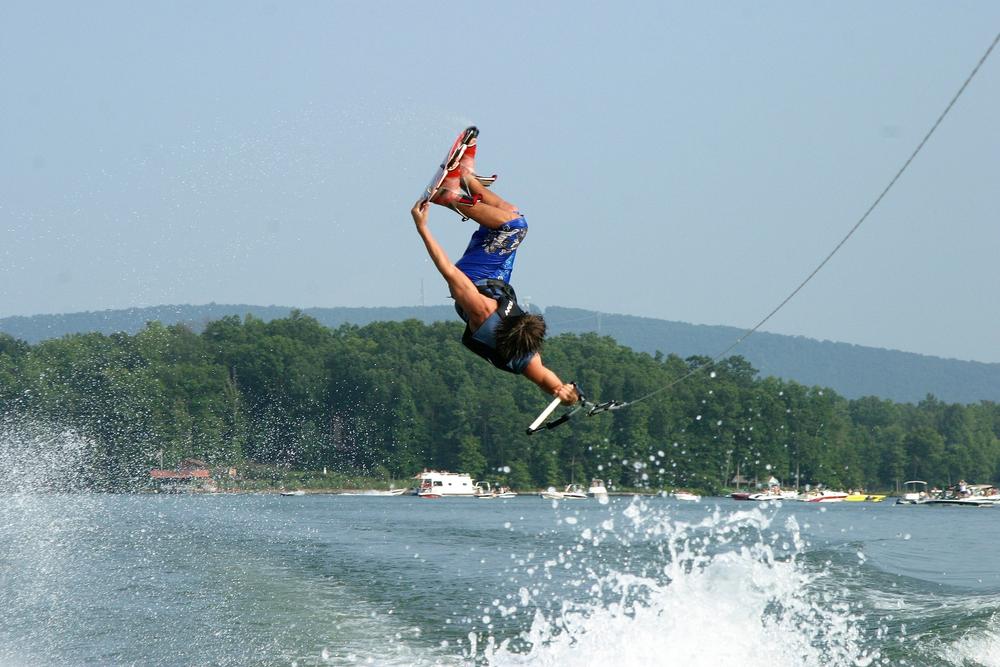 A visitor to Smith Mountain Lake in Virginia catches some air while wakeboarding.
