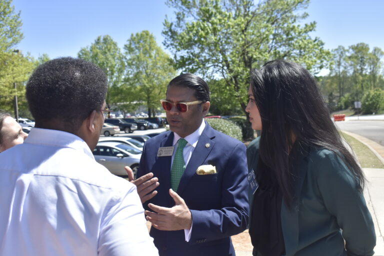 Rep. Farooq Mughal and Sen. Nabilah Islam speak with campus workers and supporters at Georgia Gwinnett College. Ross Williams/Georgia Recorder