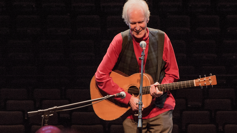 Frank Hamilton performing on stage.
