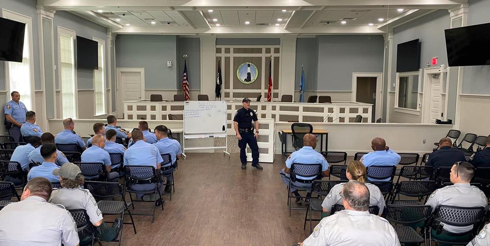 Tybee Island Police Lt. Emory Randolph briefs law enforcement officers from various state agencies on April 28, 2023, at the city's Burke Day Public Safety Building.