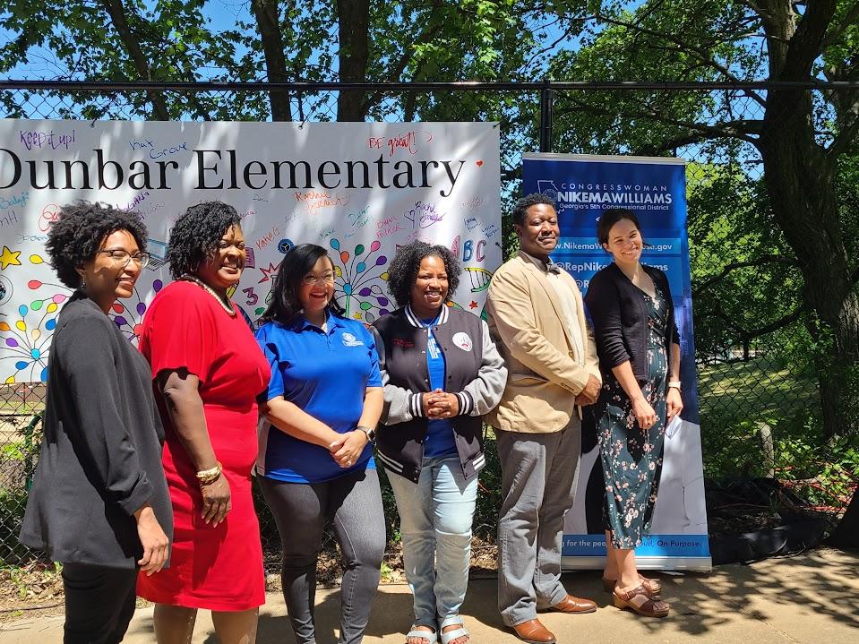 Congresswoman Nikema Williams is joined by local leaders May 2, 2023 at Paul L. Dunbar Elementary to announce Atlanta Public Schools will have 25 electric school buses thanks to federal funding.