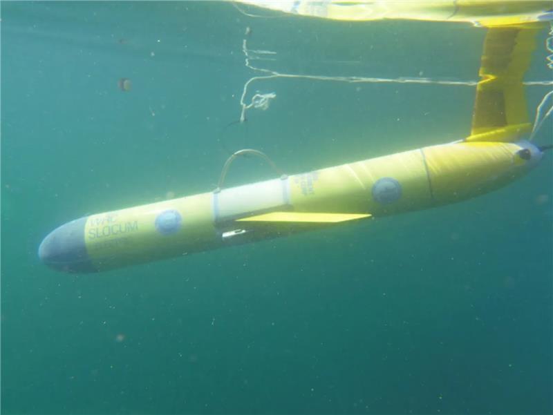 A newly launched glider still tethered to the boat