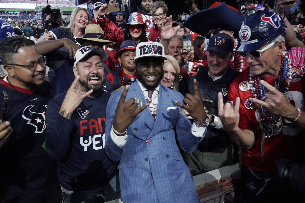 Alabama linebacker Will Anderson Jr. celebrates with fans after being chosen by the Houston Texans with the third overall pick during the first round of the NFL football draft, Thursday, April 27, 2023, in Kansas City, Mo.