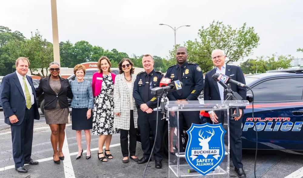 Attending Monday’s press conference announcing the Buckhead Safety Alliance’s privately funded security patrols using off-duty Atlanta Police Department officers are, from left, Robin Loudermilk, CEO of Loudermilk Companies and chair of the Atlanta Police Foundation; former APD sergeant and chair of the Buckhead Public Safety Task Force Valerie Sellers; Atlanta City Councilmember Mary Norwood; State Rep. Betsy Holland; Buckhead Council of Neighborhoods President Debra Wathen; Chief Darin Schierbaum; Maj. Ai